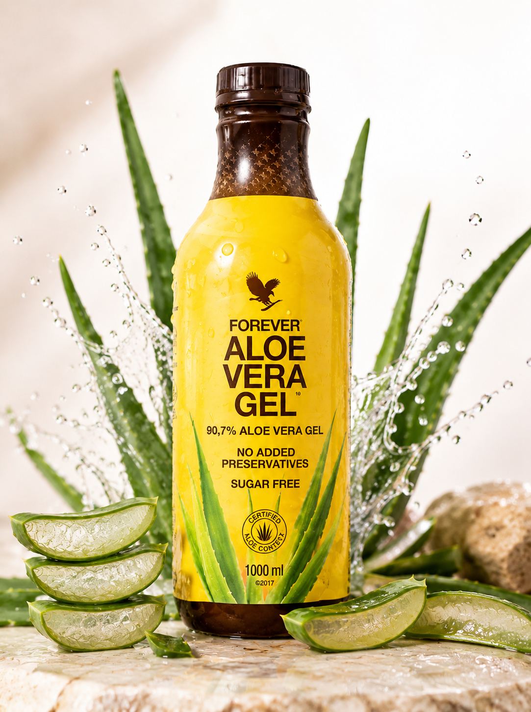 Forever Aloe Vera Gel 1L bottle with fresh aloe leaves and water splashes