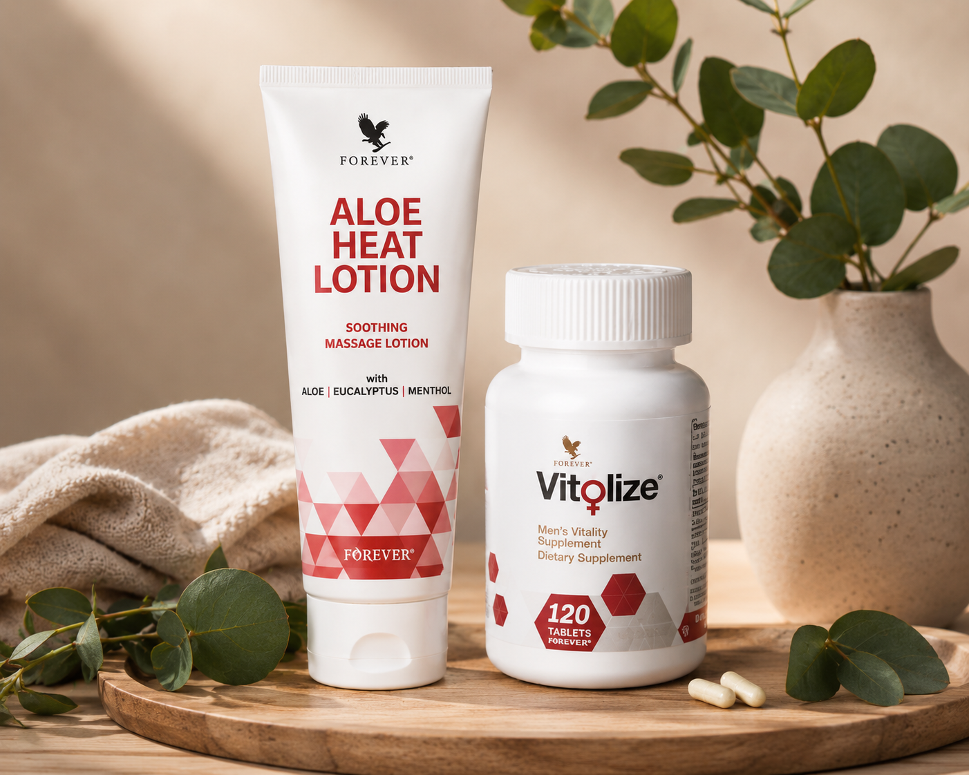 Forever Aloe Heat Lotion tube with eucalyptus leaves